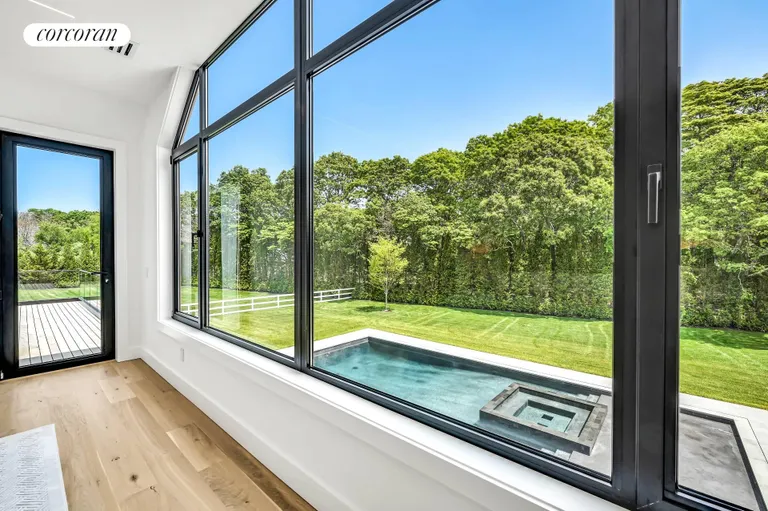 New York City Real Estate | View 390 Edge of Woods Road | Guest Room View | View 34