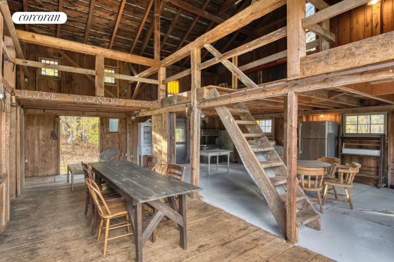 New York City Real Estate | View 151 North Ferry Road | Barn interior with loft and bath | View 28