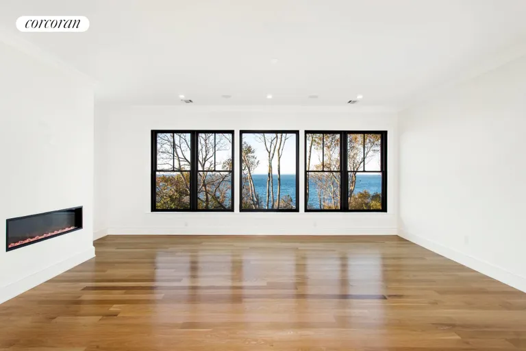 New York City Real Estate | View 17877 Soundview Avenue | Great Room w. LED FPL | View 15
