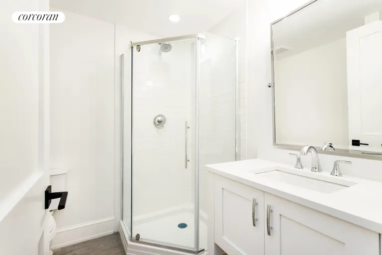 New York City Real Estate | View 17877 Soundview Avenue | Bathroom in Basement | View 21