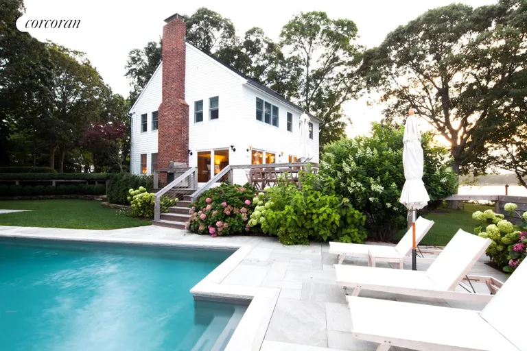 New York City Real Estate | View 6 Bluff Point Road | Bluestone clad waterside heated pool | View 4