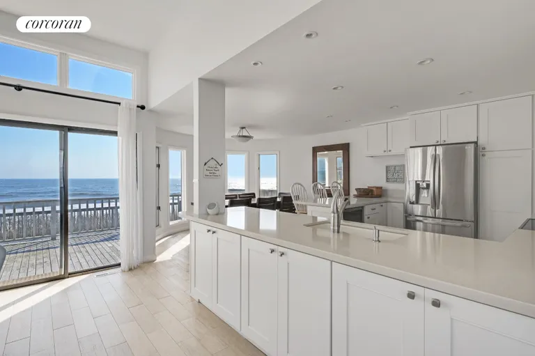 New York City Real Estate | View 40 Dune Road | Open Kitchen Living/Dining Room | View 11
