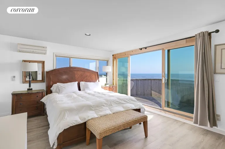 New York City Real Estate | View 40 Dune Road | Master Bedroom with Oceanfront Balcony | View 22