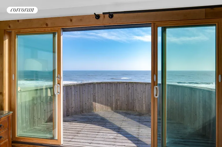 New York City Real Estate | View 40 Dune Road | Master Bedroom with Oceanfront Balcony | View 23