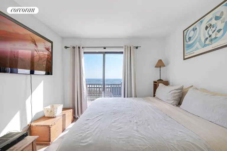 New York City Real Estate | View 40 Dune Road | Oceanfront Bedroom with Balcony | View 25