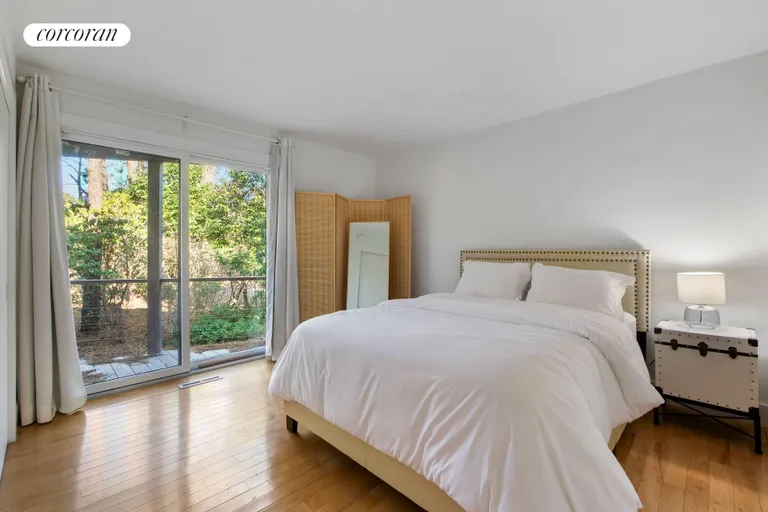 New York City Real Estate | View 25 Blackwatch Court | Bedroom with Private Deck | View 15