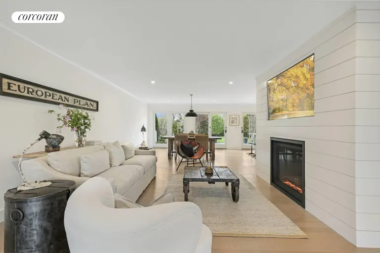 New York City Real Estate | View 520 Hampton Road, Unit 28 | Beautiful Living Room with Gas Fireplace | View 2