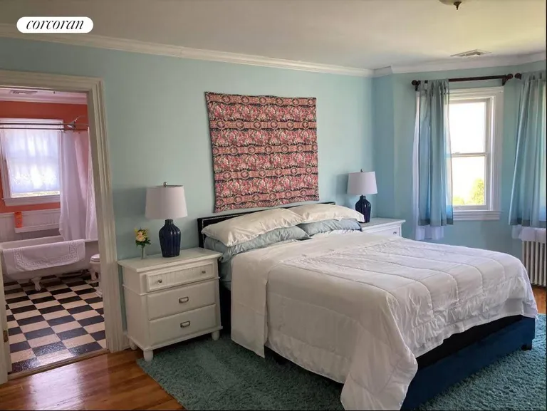 New York City Real Estate | View 3965 Grand Avenue | Primary Bedroom with Queen Bed | View 24