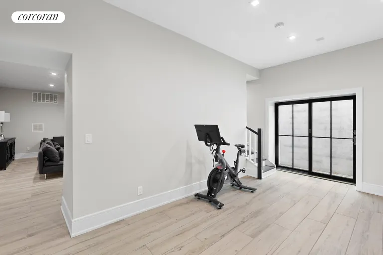 New York City Real Estate | View 135 Lewis Street | Gym/Play Room on Lower Level | View 22