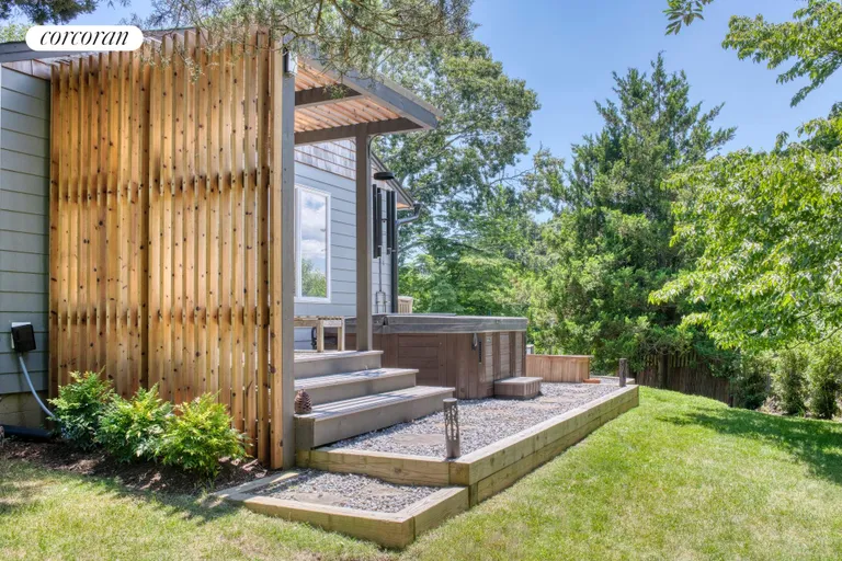 New York City Real Estate | View 7 Gazon Road | screened hot tub area | View 25