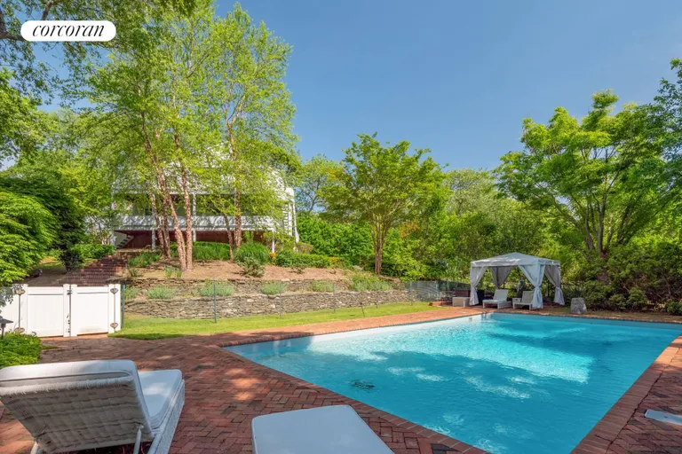 New York City Real Estate | View 14 Farragut Road | sitting by pool | View 10