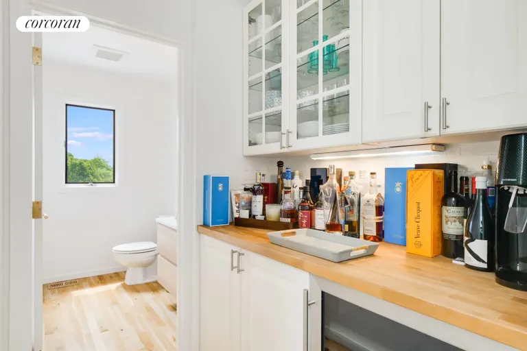 New York City Real Estate | View 14 Farragut Road | wet bar on upper level | View 18