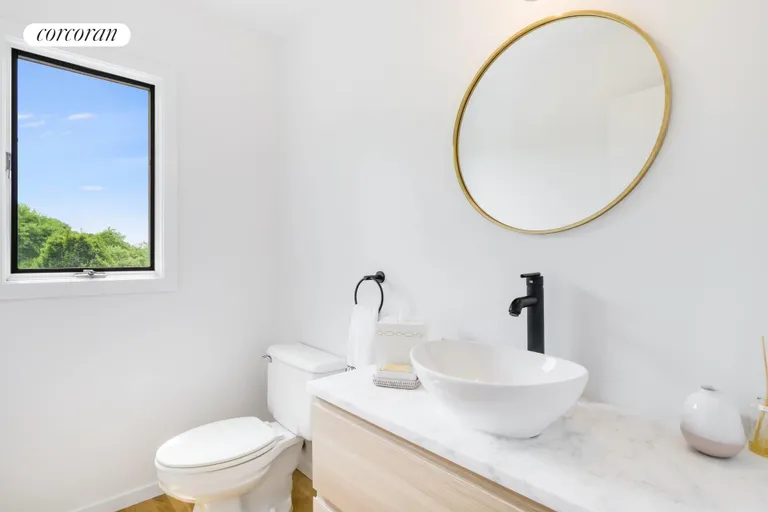 New York City Real Estate | View 14 Farragut Road | powder room on upper level | View 19