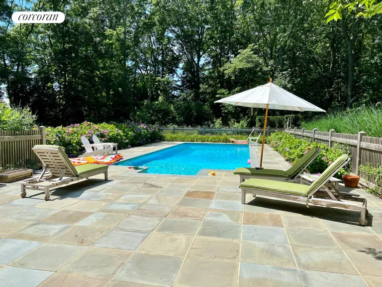 New York City Real Estate | View 22 Glenwood Lane | Pool with large patio | View 3