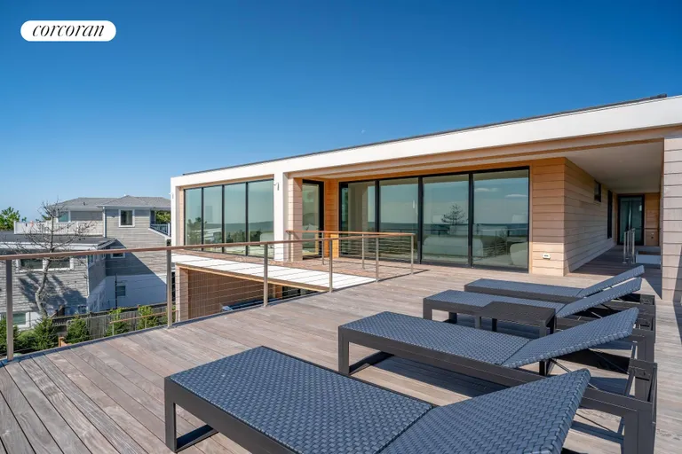 New York City Real Estate | View 345 Dune Road | Upper Deck off Primary Suites | View 19