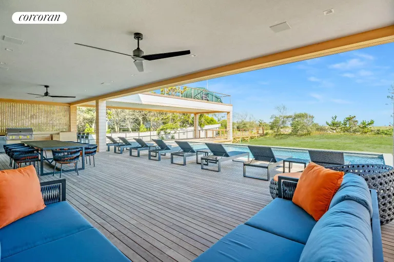New York City Real Estate | View 345 Dune Road | Ocean-side Deck with Outdoor Kitchen | View 31