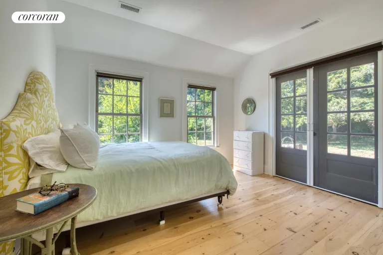 New York City Real Estate | View 119 & 121 South Midway Road | bedroom #1 /private patio | View 26