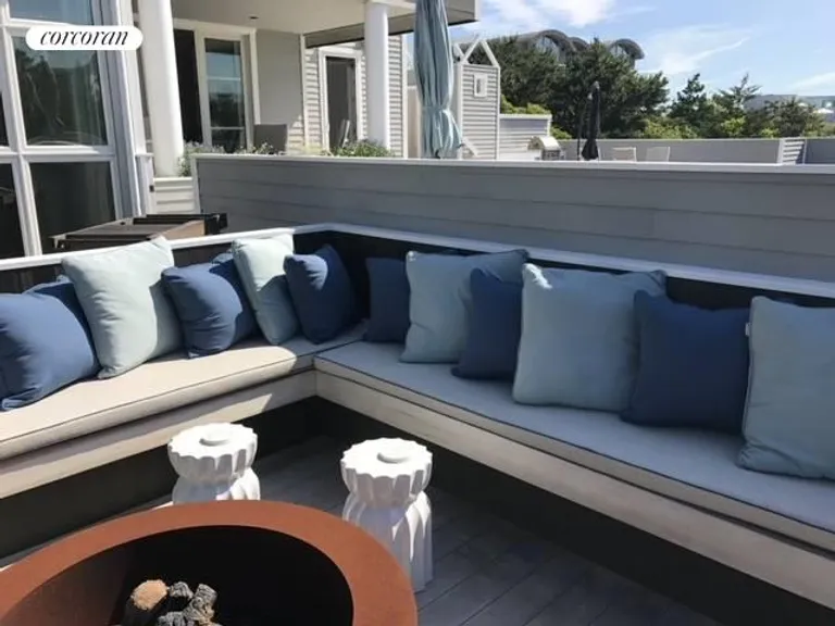 New York City Real Estate | View 7 Mitchell Dunes Lane | Firepit seating | View 18