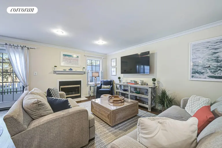New York City Real Estate | View 10 Brittany Lane | Living Room with Fireplace | View 6