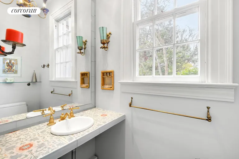 New York City Real Estate | View 16 Sheppard Street | Full Hall Bathroom | View 15