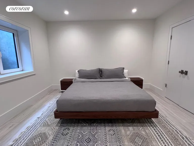 New York City Real Estate | View 42 Edwards Avenue | Lower level king bedroom | View 20