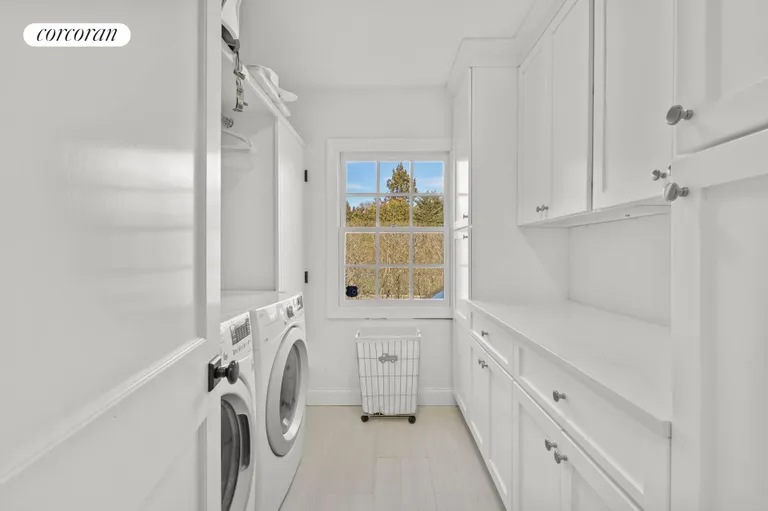 New York City Real Estate | View 245 Oneck Lane | Laundry Room off Mudroom | View 14