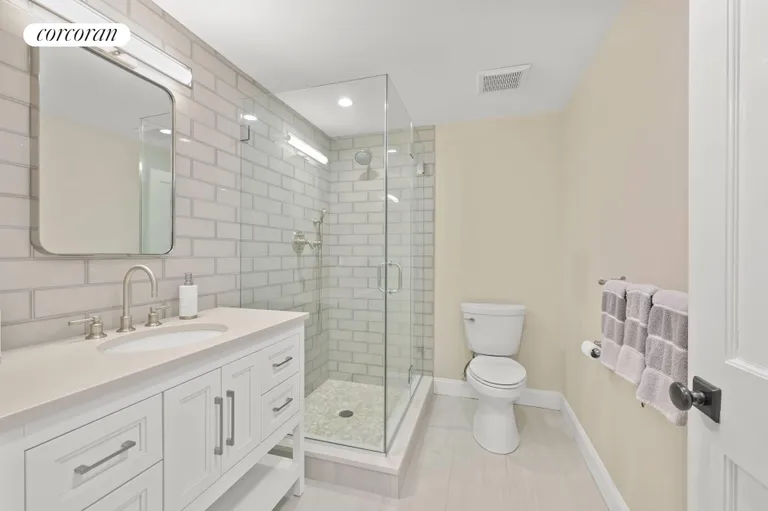 New York City Real Estate | View 245 Oneck Lane | Full Bath off Mudroom | View 15