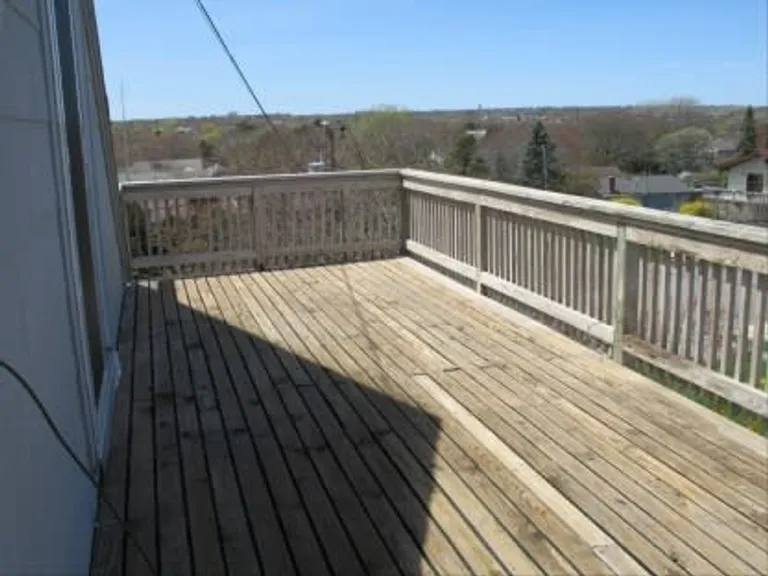 New York City Real Estate | View 23 Caswell Road | master deck | View 9