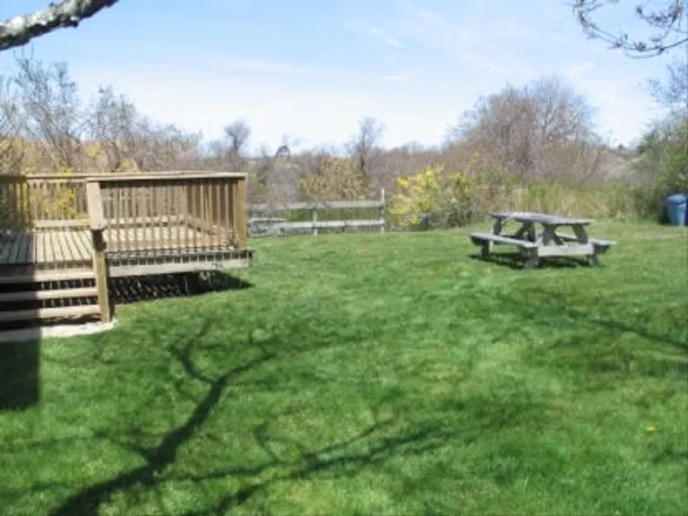 New York City Real Estate | View 23 Caswell Road | lovely deck and yard | View 10
