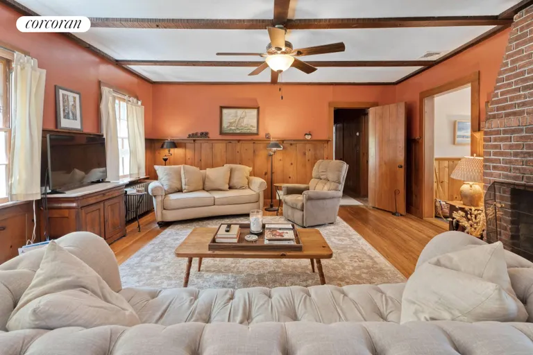 New York City Real Estate | View 4 Red Creek Road | Living Room with Wood-Burning Fireplace | View 8