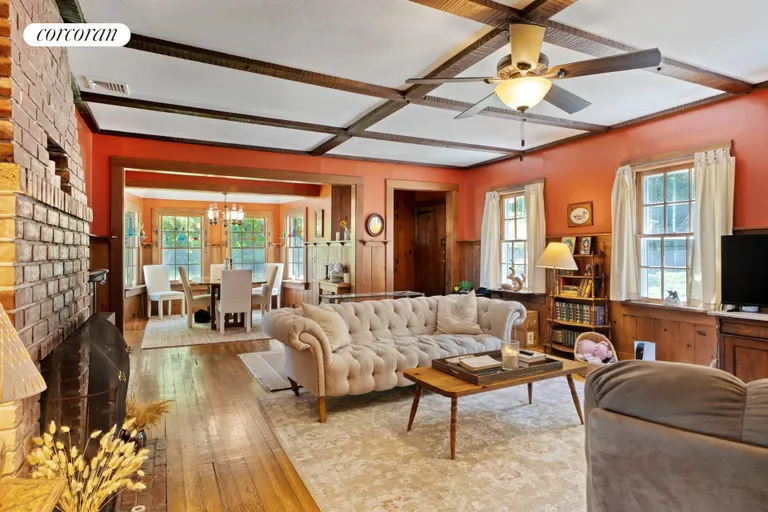 New York City Real Estate | View 4 Red Creek Road | Living Room with Dining Nook | View 9
