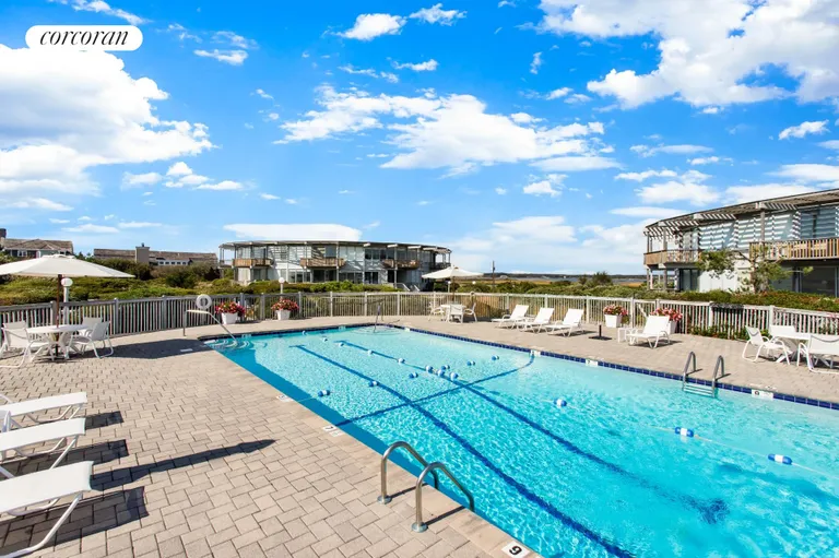 New York City Real Estate | View 101 Dune Road, Unit B14 | Heated Pool | View 2
