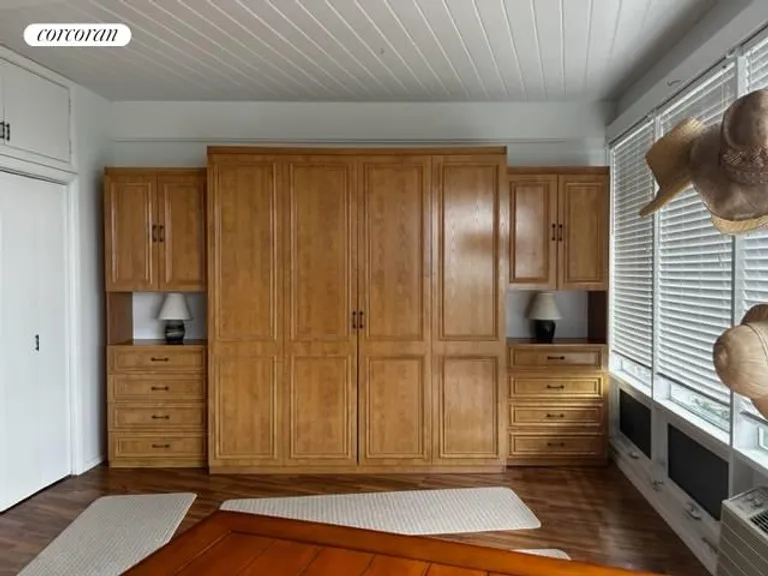 New York City Real Estate | View 101 Dune Road, Unit B14 | King Size Murphy Bed | View 5