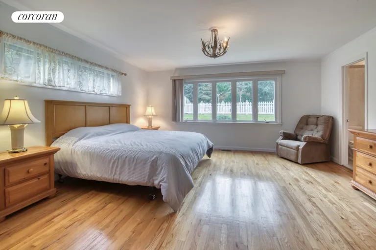 New York City Real Estate | View 65 North Midway Road | Primary ensuite bedroombedroom | View 8