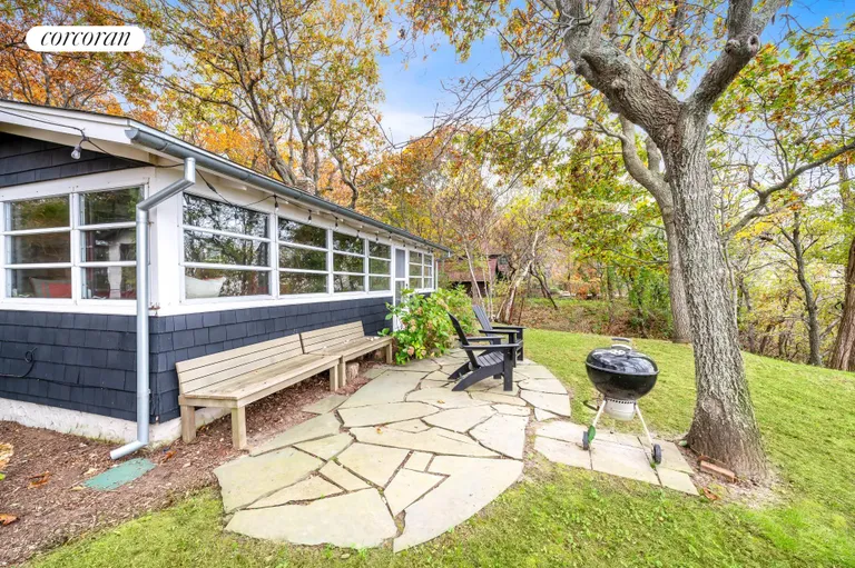 New York City Real Estate | View 400 Diamond Lane | Back Patio with Water View and BBQ | View 5