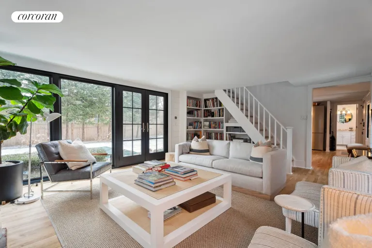 New York City Real Estate | View 10 Wireless Road | Living Room with wall of windows | View 3