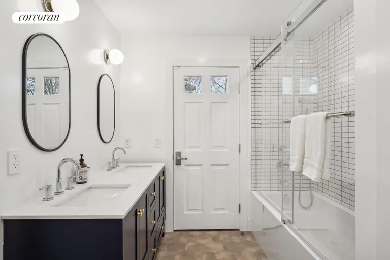 New York City Real Estate | View 28 Old Meeting House Road | Guest Bath with Shared Outdoor Shower | View 17