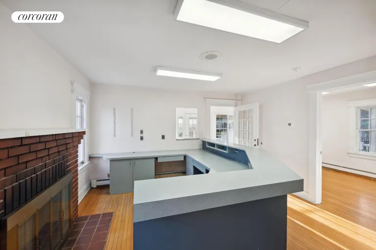 New York City Real Estate | View 1018 Roanoke Avenue | Reception with Fireplace | View 12