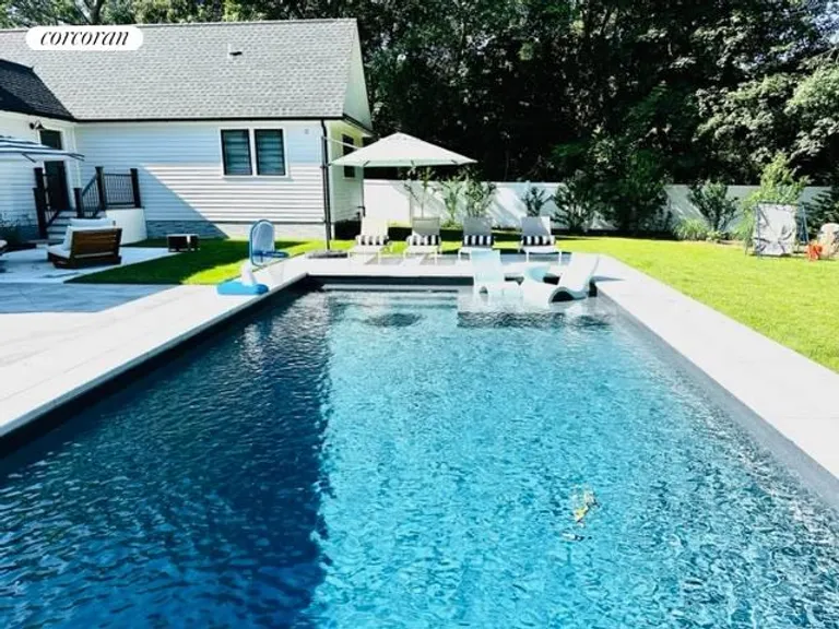 New York City Real Estate | View 52 Lilac Road | Heated pool with ledge | View 13