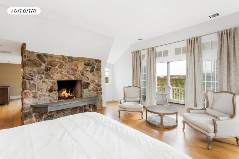 New York City Real Estate | View 14990 Oregon Road | Primary with Ensuite and Fireplace | View 21