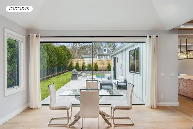 New York City Real Estate | View 43 Newtown Road | Dining Area looking Outside | View 10