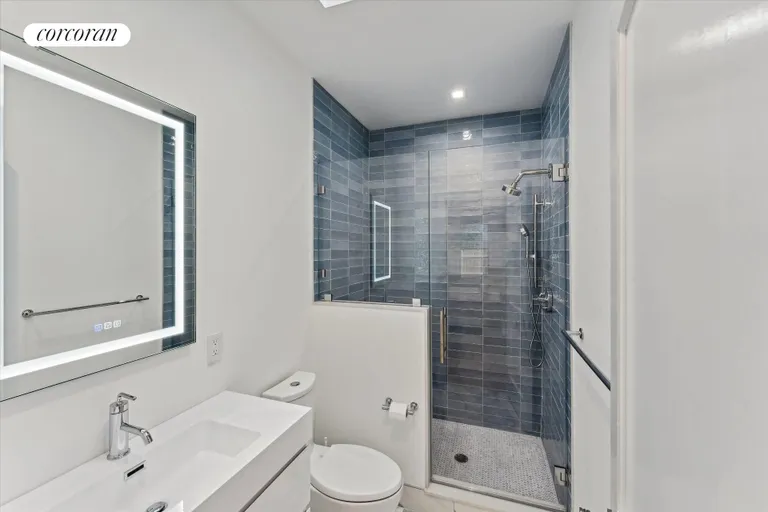 New York City Real Estate | View 43 Newtown Road | Main Level Guest Bath | View 18