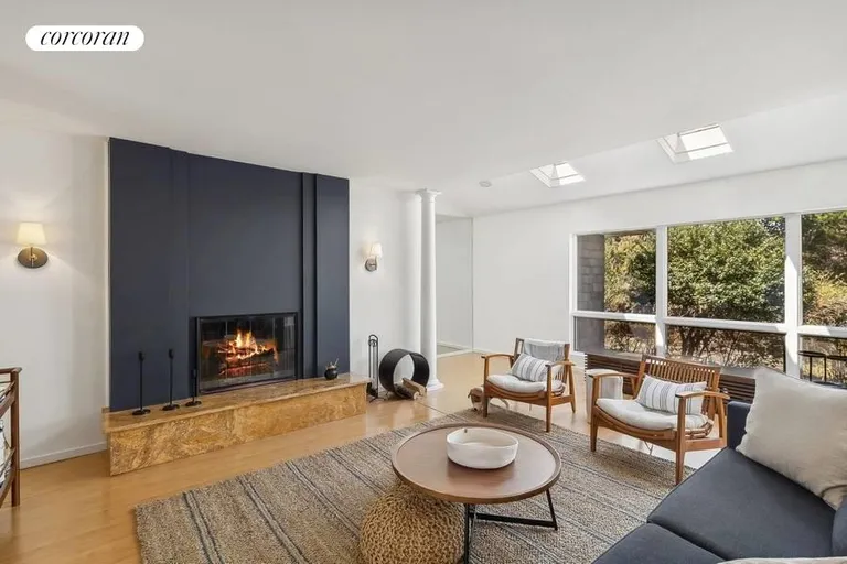 New York City Real Estate | View 250 Pine Tree Ext | Living Room with Fireplace | View 11