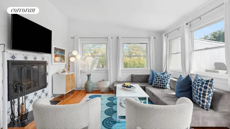 The Hamptons Real Estate | View 9 Tanners Neck Lane | Living Room with Fireplace | View 3