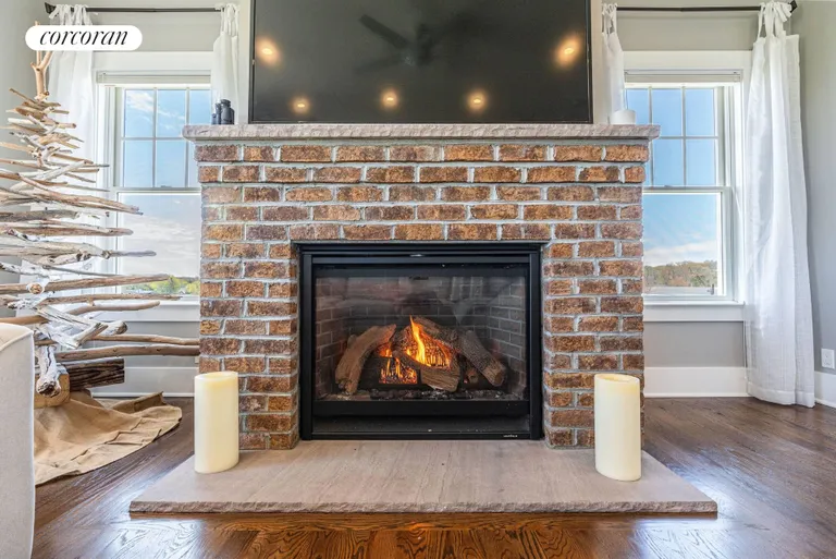 The Hamptons Real Estate | View 1263 Northville Turnpike | Gas Fireplace in Living Room | View 7