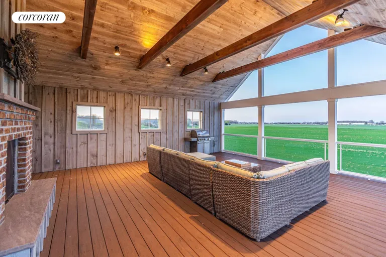 The Hamptons Real Estate | View 1263 Northville Turnpike | Second Story Covered Porch | View 17