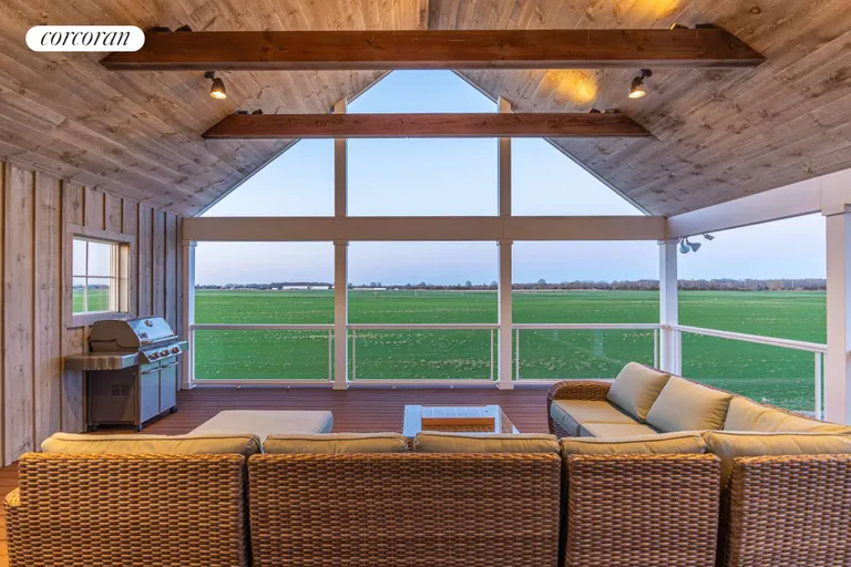 The Hamptons Real Estate | View 1263 Northville Turnpike | Second Story Covered Porch | View 18