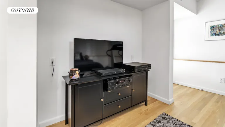 New York City Real Estate | View 34 Hawthorne Road | Downstairs Library With Flat Screen TV | View 19