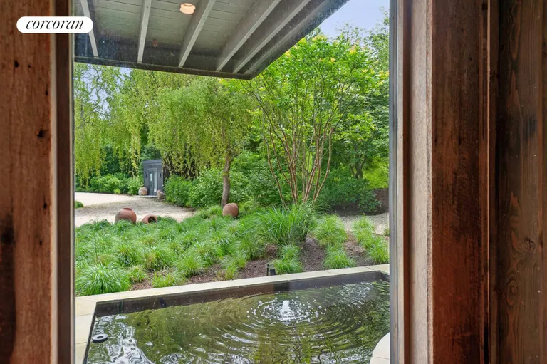 New York City Real Estate | View 53 Kettle Hole Road | view overlooking koi pond | View 34