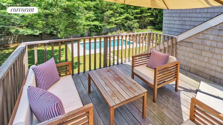 New York City Real Estate | View 18 Bay View Road | Upstairs Deck With Umbrella | View 27